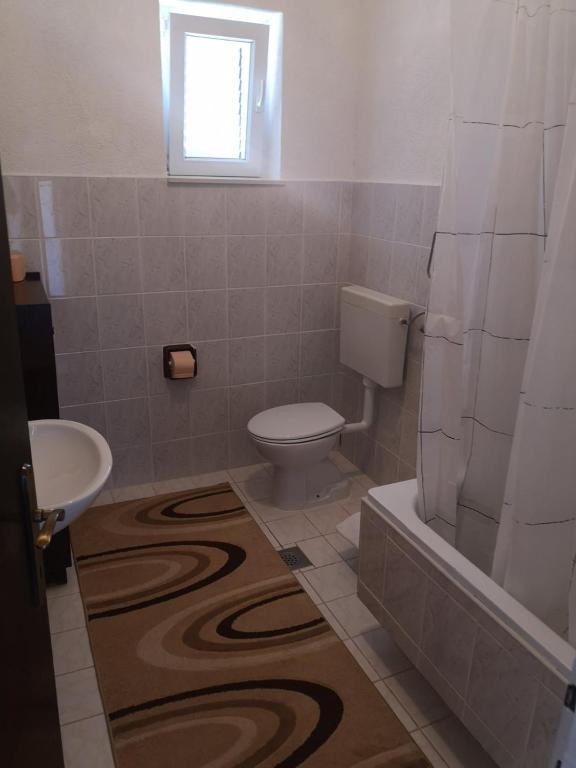 Koupelna v ubytování Apartment Dada