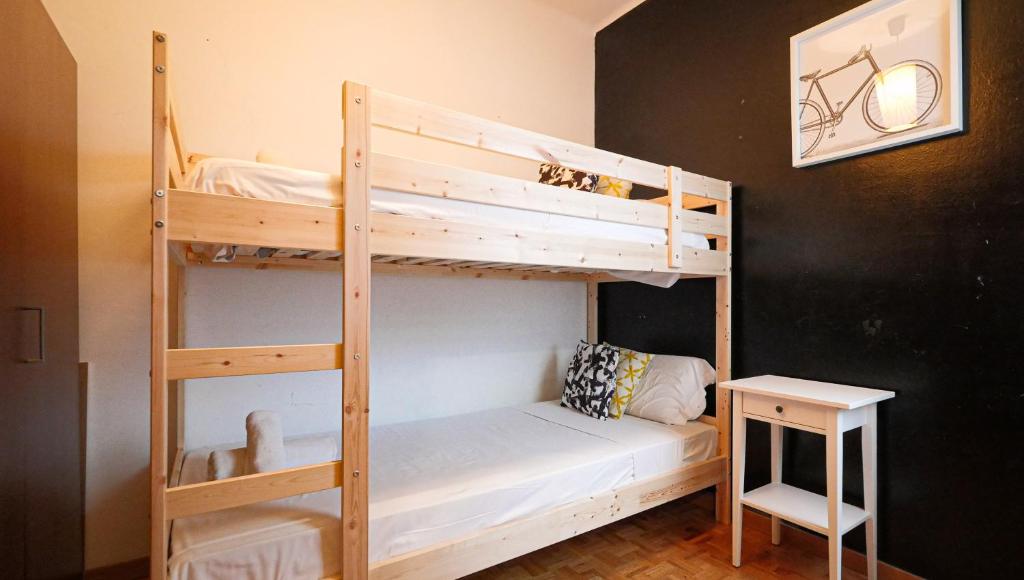 Postel nebo postele na pokoji v ubytování Bed&Bcn Sant Andreu