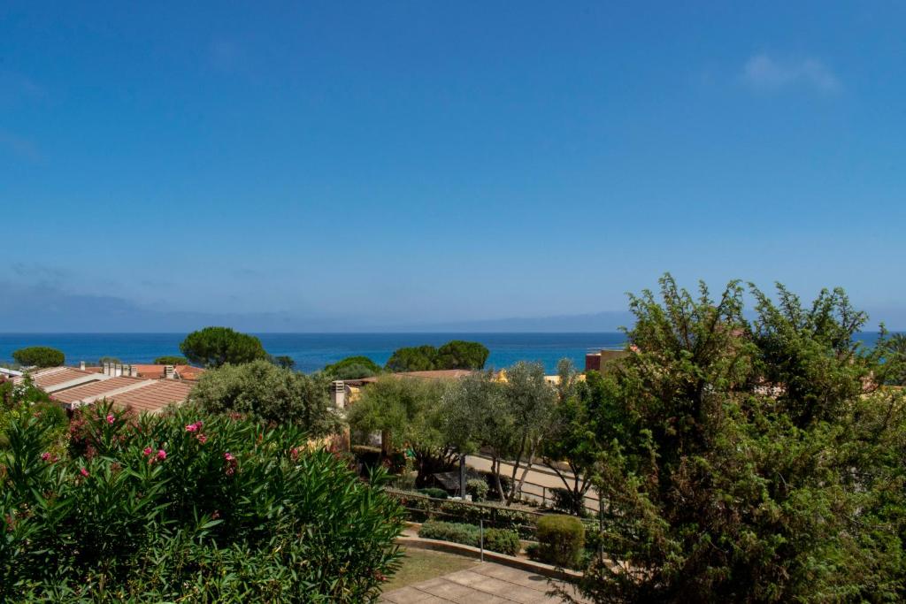 a view of the ocean from the roof of a building at Casa Deidda in Villaputzu