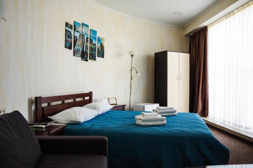 Postel nebo postele na pokoji v ubytování Hotel Marinara