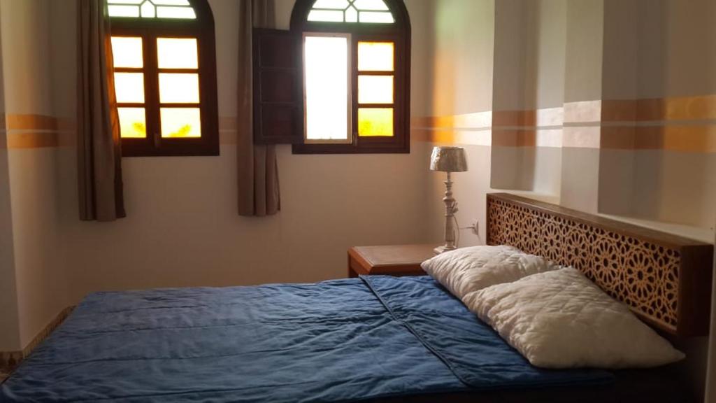 Postel nebo postele na pokoji v ubytování Riad Salt River