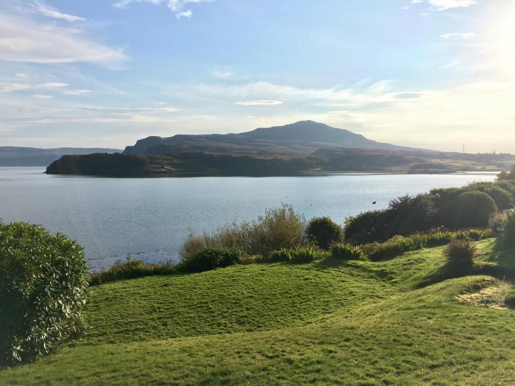 a view of a lake with a mountain in the background at An-Airidh Bed & Breakfast Portree in Portree
