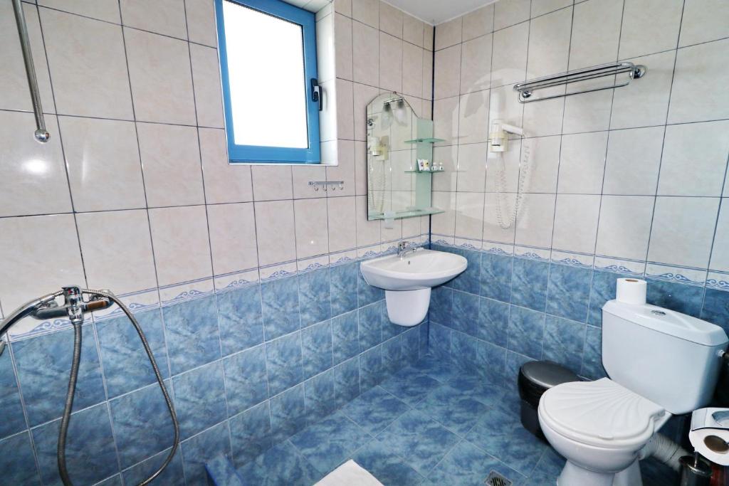 Koupelna v ubytování Bora Bora Hotel