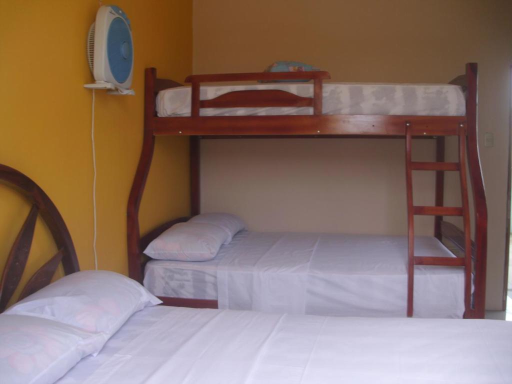 Postel nebo postele na pokoji v ubytování Hostal Alcazaba
