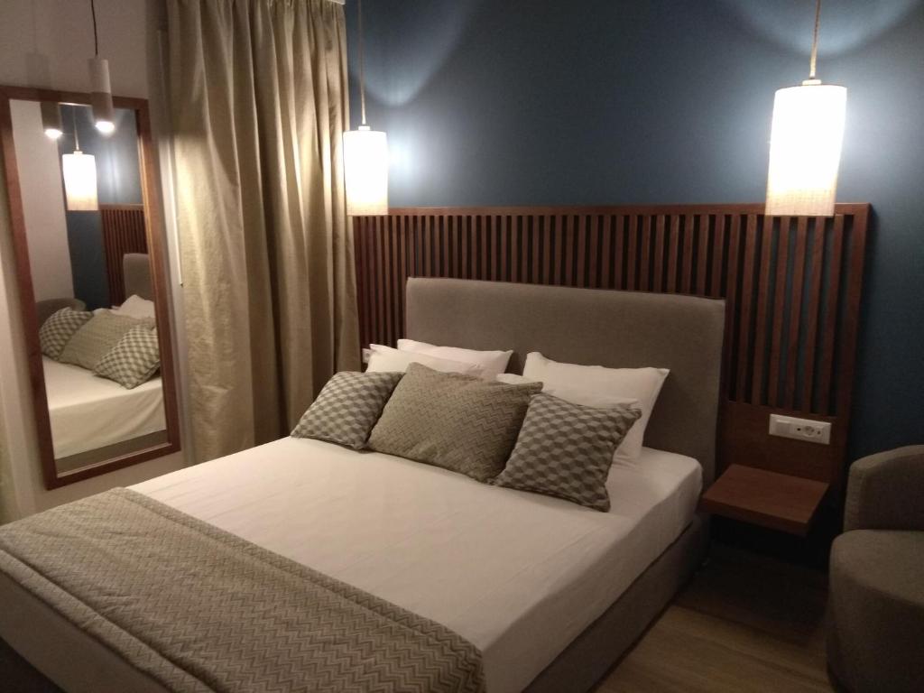 Voodi või voodid majutusasutuse Ariadni Rooms & Apartments toas
