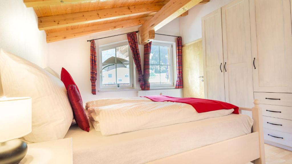 Posteľ alebo postele v izbe v ubytovaní Alpen Loft