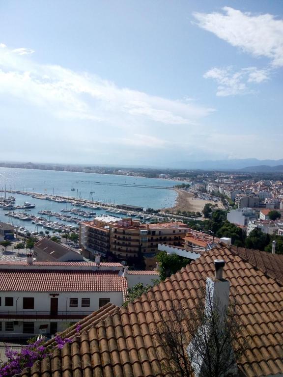 a view of a city and the ocean from a building at Rosas-Puig Rom -VISTA MAR in Roses