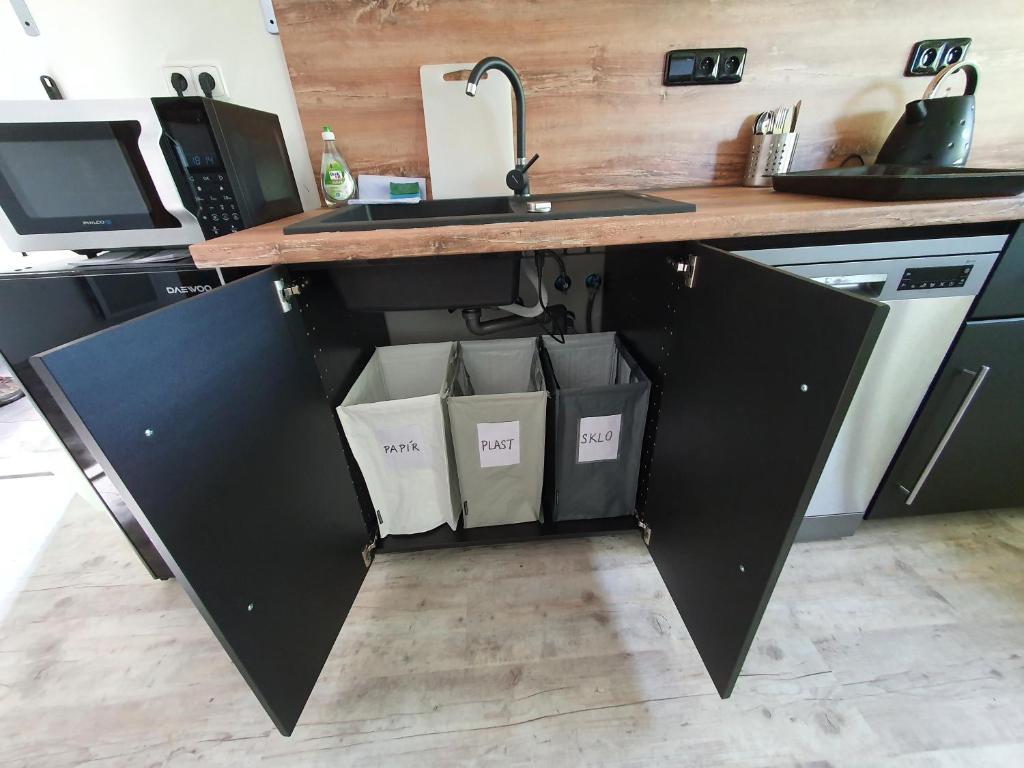 Kuchyň nebo kuchyňský kout v ubytování Apartmány Svatá