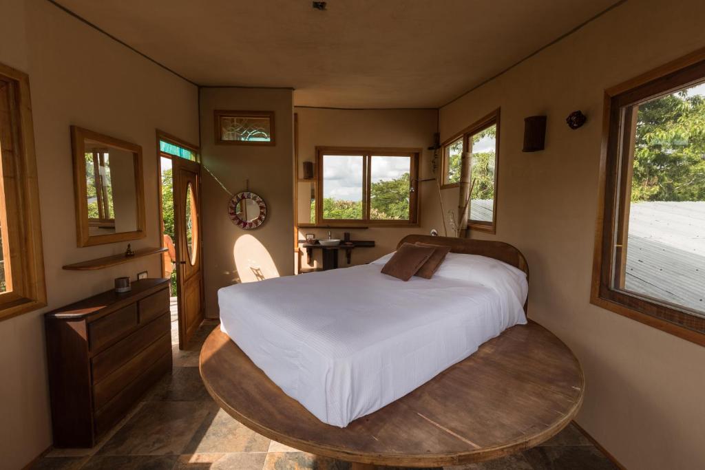 Postel nebo postele na pokoji v ubytování Villas Adriana, Palenque