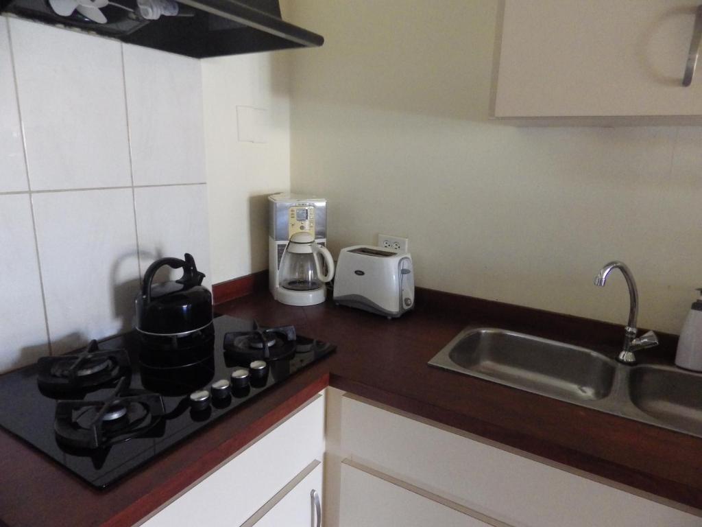A cozinha ou cozinha compacta de Aruba Cunucu Residence
