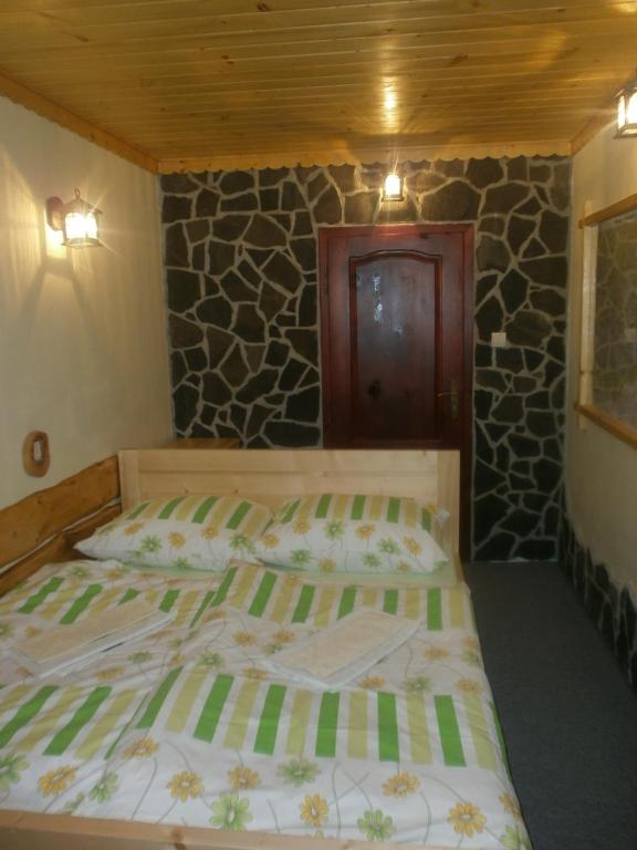 Postel nebo postele na pokoji v ubytování ASPEN