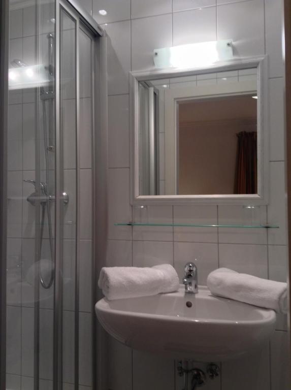 A bathroom at Appartements Basti