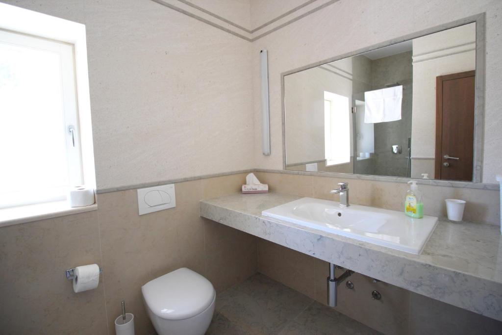 Kúpeľňa v ubytovaní Villa Minu