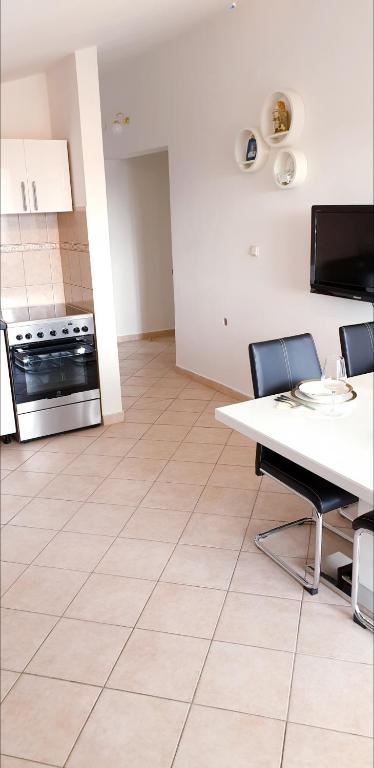 Kuchyň nebo kuchyňský kout v ubytování Apartment Antonio
