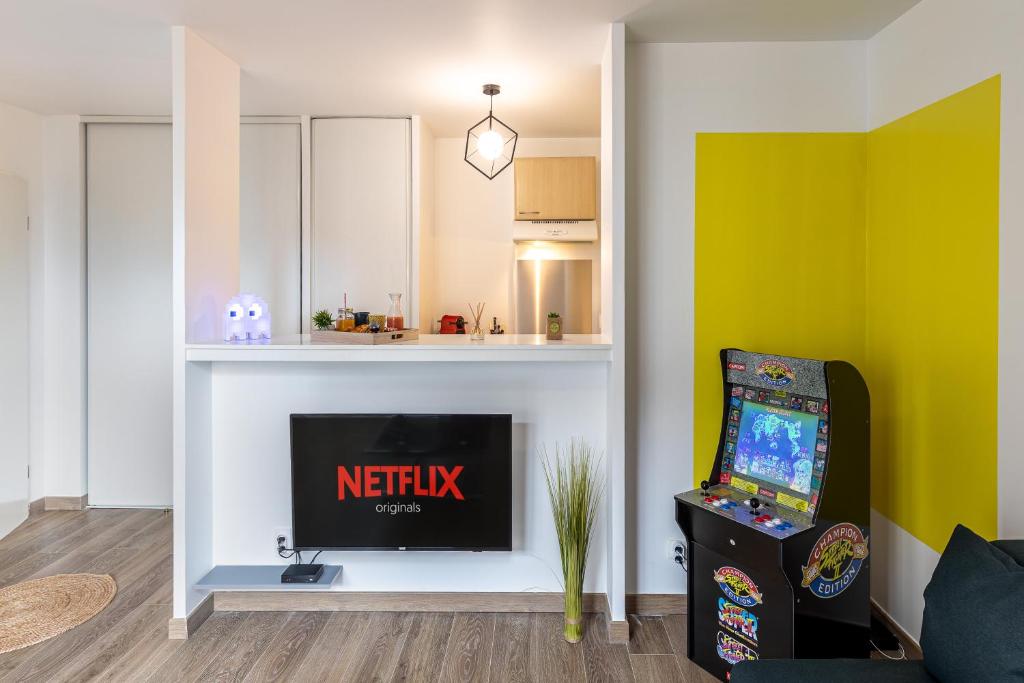 En tv och/eller ett underhållningssystem på La Suite Arcade - SDP