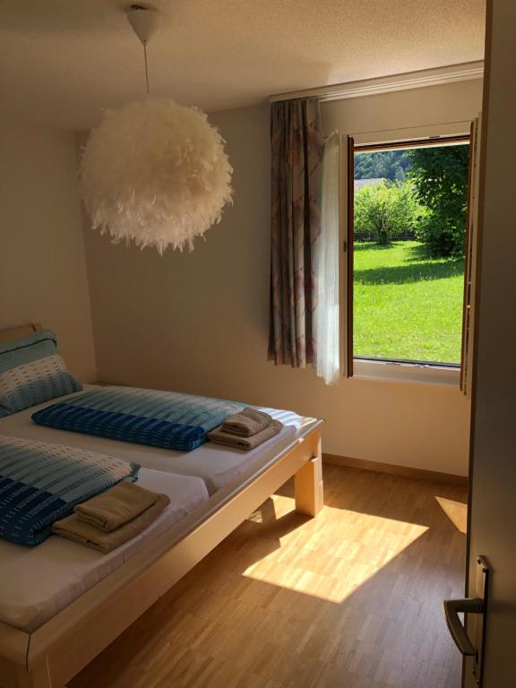 Postel nebo postele na pokoji v ubytování Apartment Laura