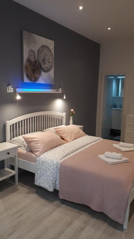Łóżko lub łóżka w pokoju w obiekcie Guesthouse Mila