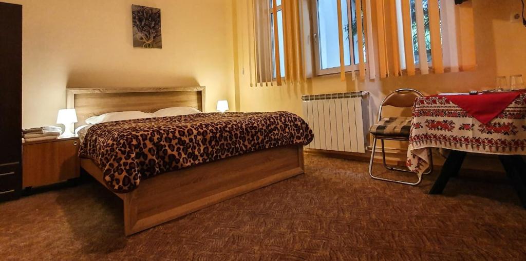 Postel nebo postele na pokoji v ubytování Vila Coca