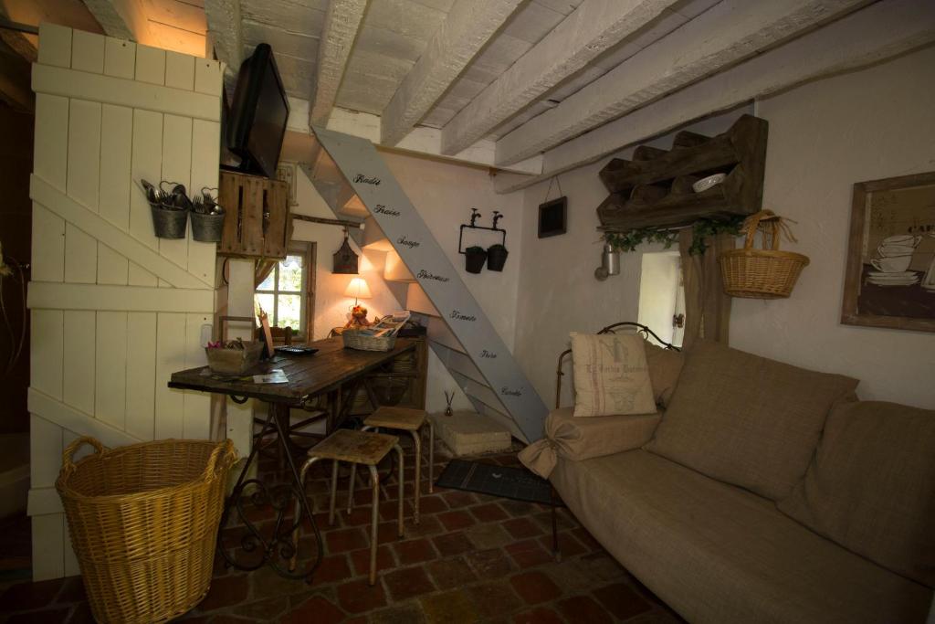 Posezení v ubytování Gîte "L'Annexe du Parc" Sa Vue Splendide