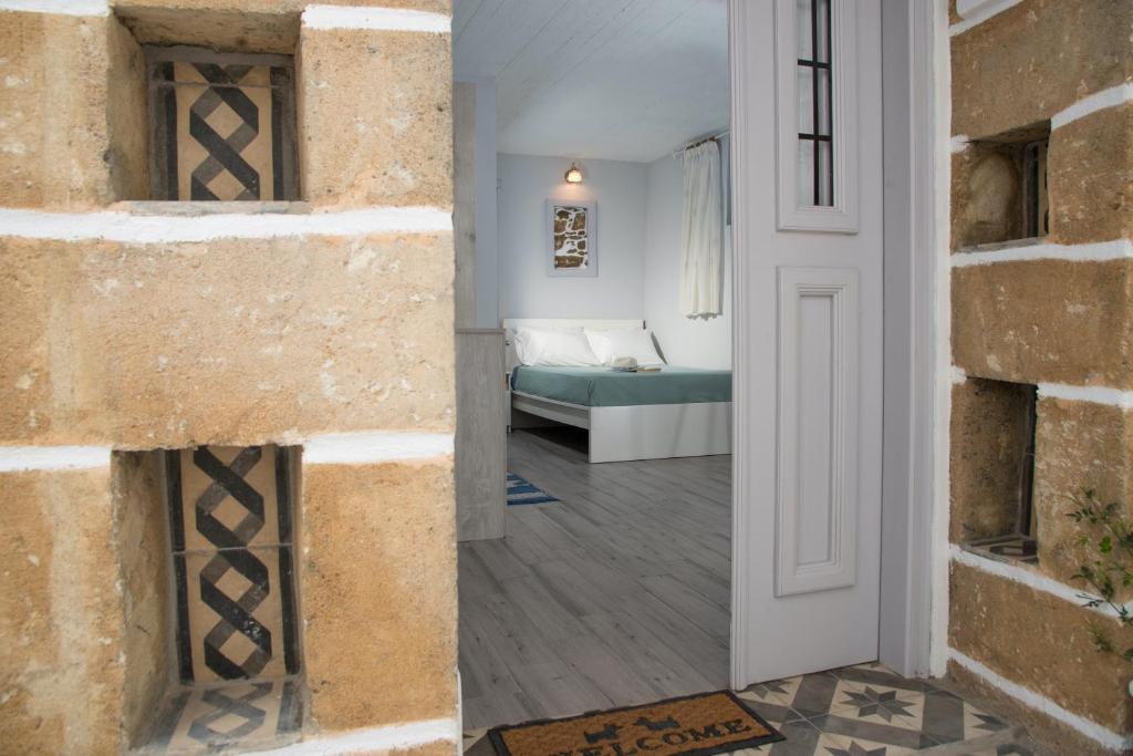 Posteľ alebo postele v izbe v ubytovaní Studio Cozy - In the Heart of Skyros Village