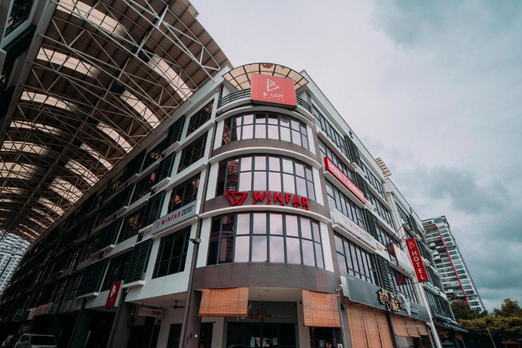 a building with a sign on the side of it at B Lot Hotel in Kuala Lumpur
