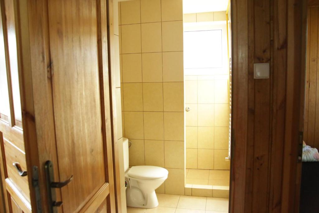 Kúpeľňa v ubytovaní Camping Oaza Błonie Kórnik Domki Standard - 3 pokoje