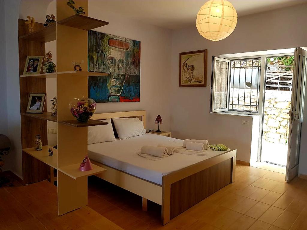 Postel nebo postele na pokoji v ubytování Aira Apartment