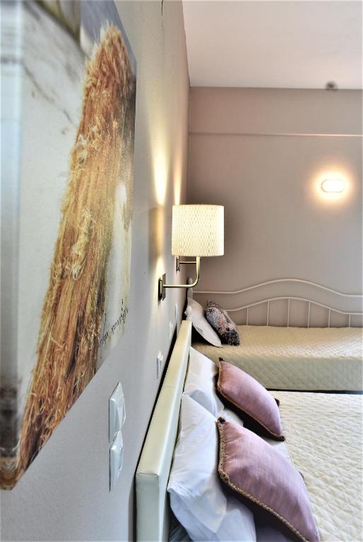 Łóżko lub łóżka w pokoju w obiekcie Studios Thea Fresh Rooms Thassos