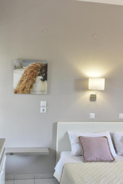 Łóżko lub łóżka w pokoju w obiekcie Studios Thea Fresh Rooms Thassos