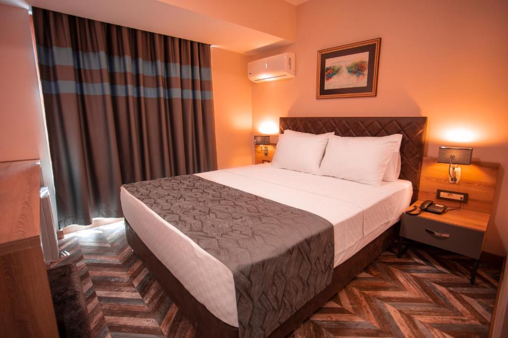 Postel nebo postele na pokoji v ubytování Hotel Kale 17