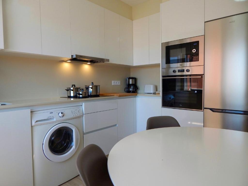 Kuchnia lub aneks kuchenny w obiekcie CORAL HOME