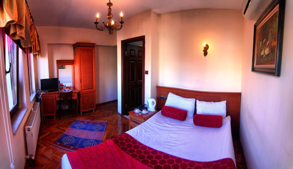Postel nebo postele na pokoji v ubytování Kervansaray Canakkale Hotel - Special Category