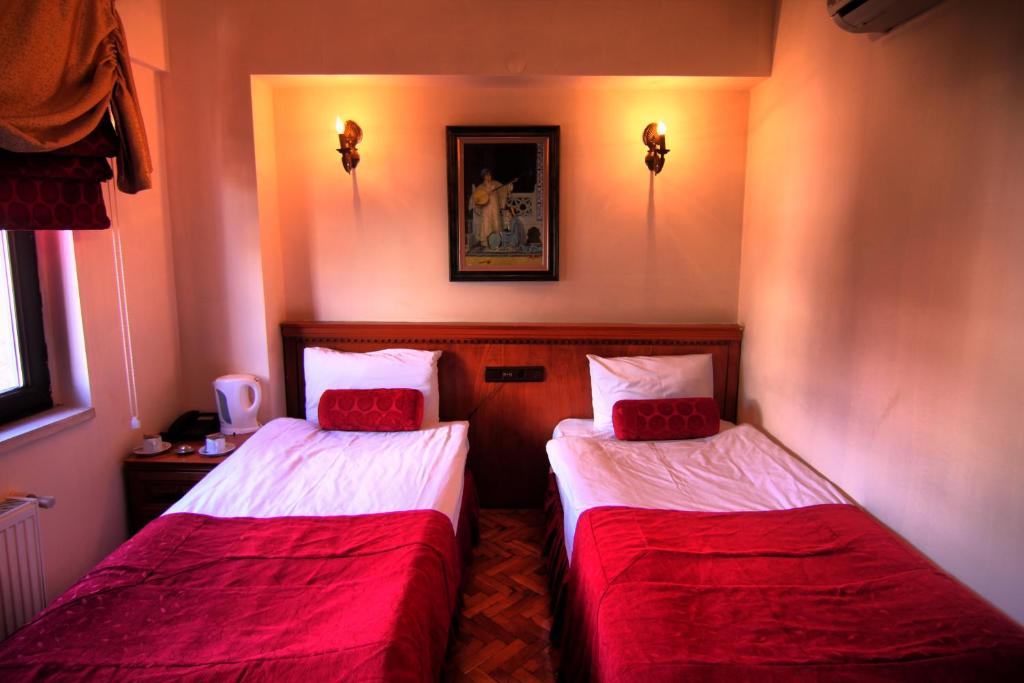 Postel nebo postele na pokoji v ubytování Kervansaray Canakkale Hotel - Special Category