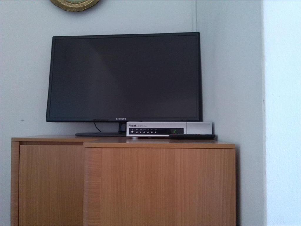 Телевизор и/или развлекательный центр в Rooms Katica