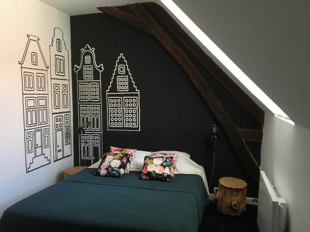 Postel nebo postele na pokoji v ubytování Boutique Hotel B&B Fleurie