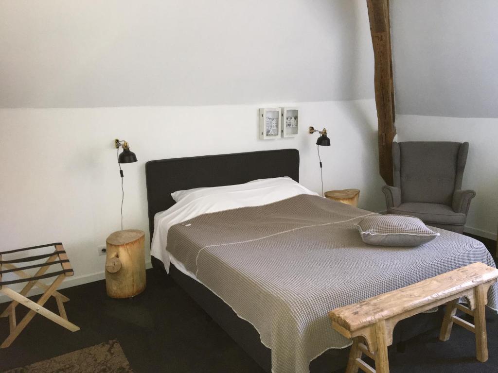 Postel nebo postele na pokoji v ubytování Boutique Hotel B&B Fleurie