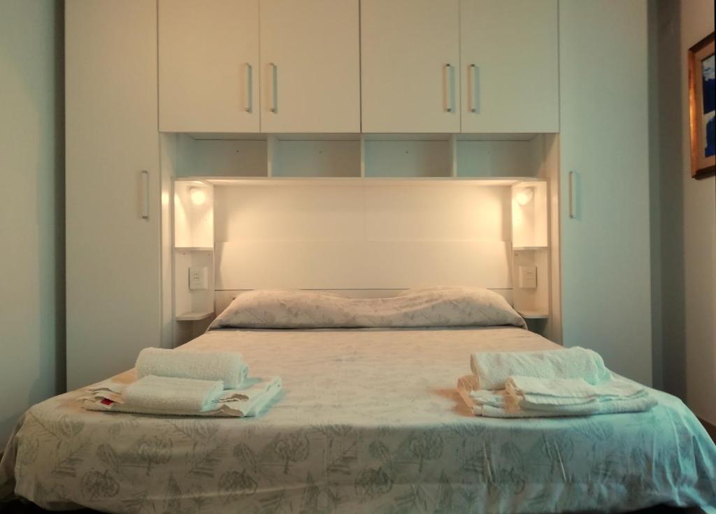 Postel nebo postele na pokoji v ubytování Le mille e una notte