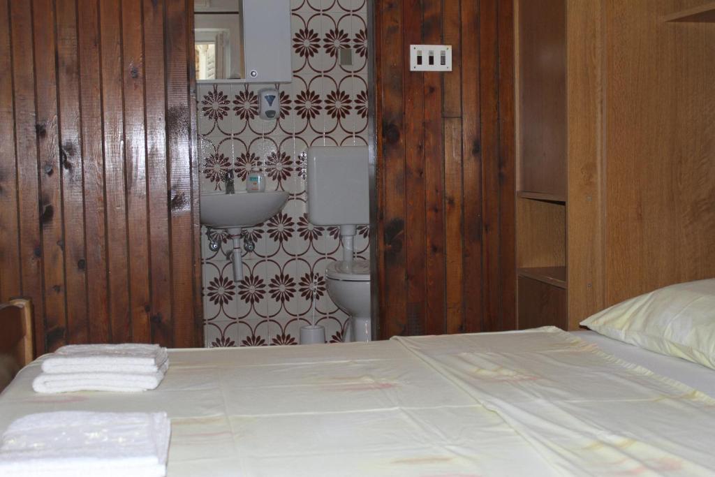Postel nebo postele na pokoji v ubytování GORAN'S PLACE