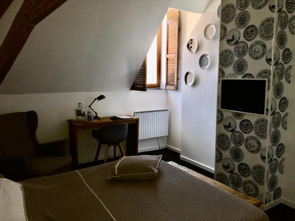 TV a/nebo společenská místnost v ubytování Boutique Hotel B&B Fleurie