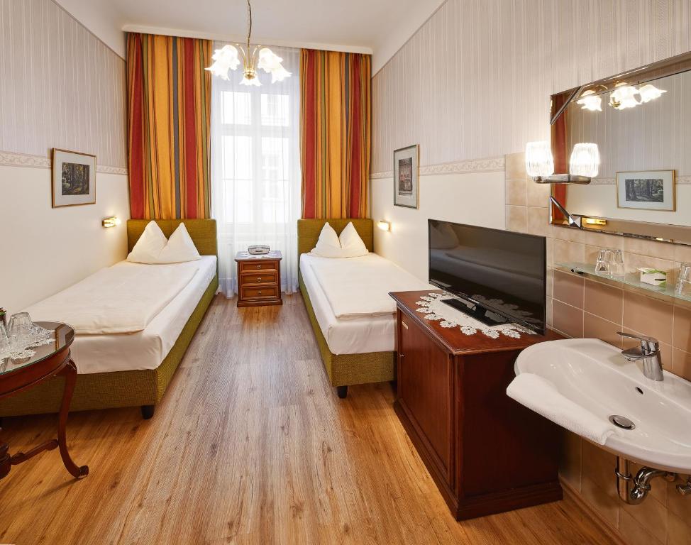Postel nebo postele na pokoji v ubytování Hotel Austria - Wien