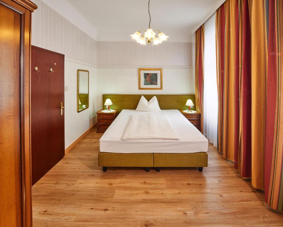 Postel nebo postele na pokoji v ubytování Hotel Austria - Wien