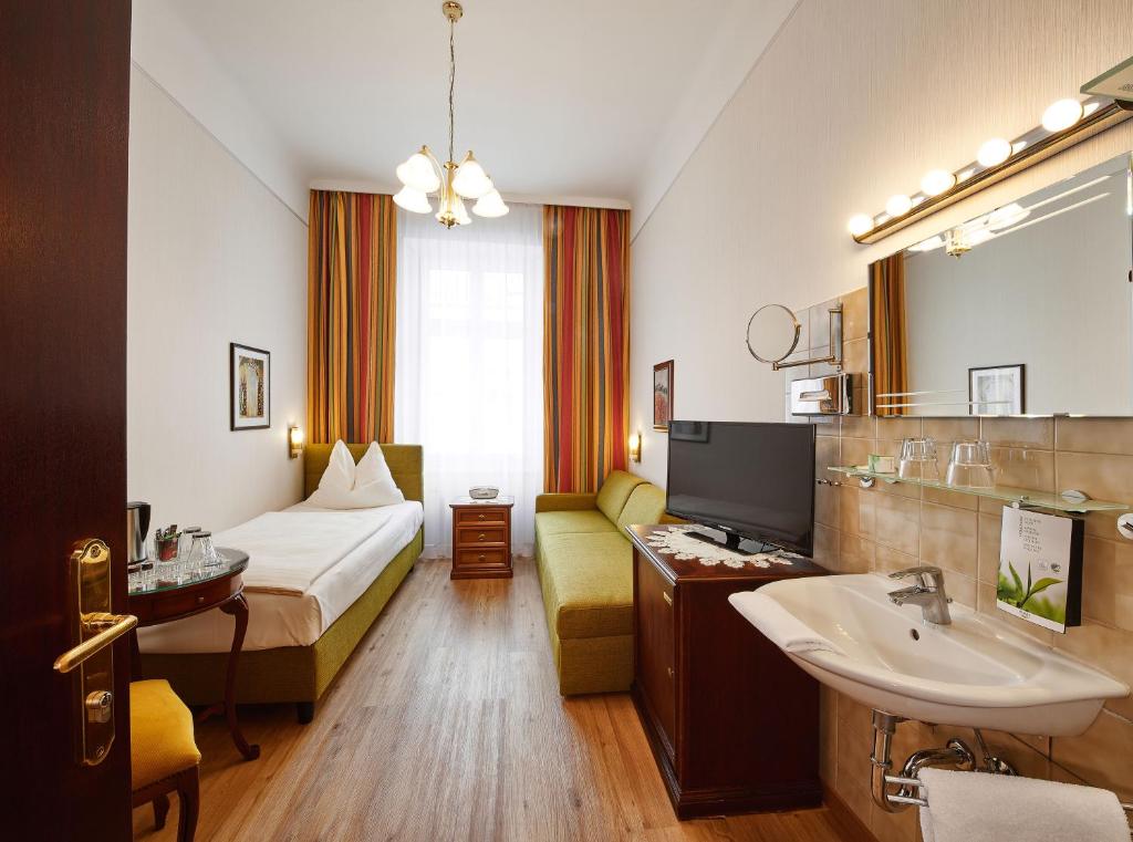 Postel nebo postele na pokoji v ubytování Hotel Austria - Wien