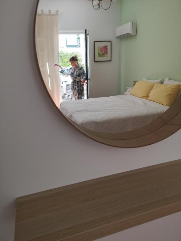Postel nebo postele na pokoji v ubytování Twin House Spetses