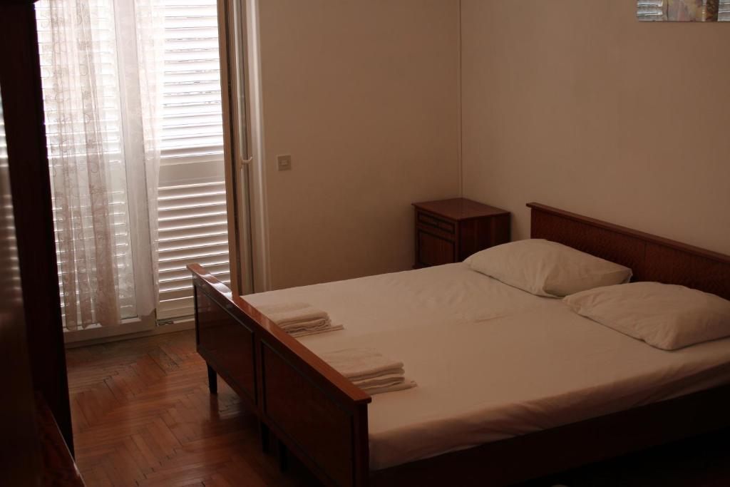 Postel nebo postele na pokoji v ubytování GORAN'S PLACE