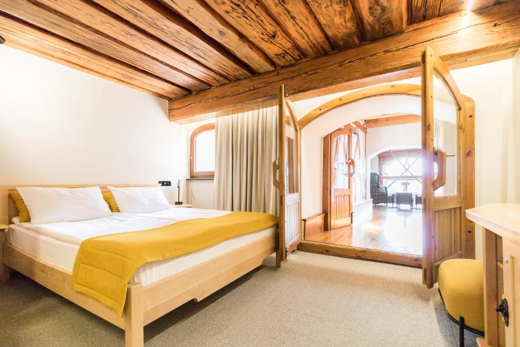 Łóżko lub łóżka w pokoju w obiekcie Hotel Spichrz