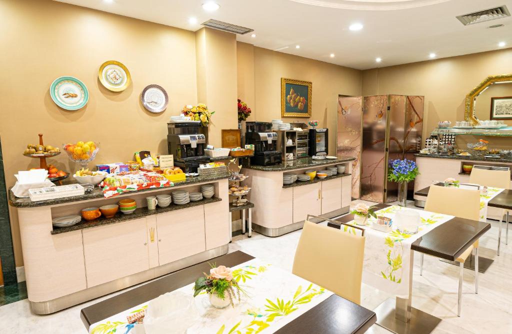 Kuchyň nebo kuchyňský kout v ubytování Hotel Sancho
