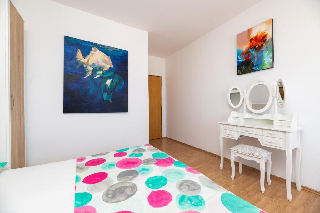 Posteľ alebo postele v izbe v ubytovaní Apartman Petelin