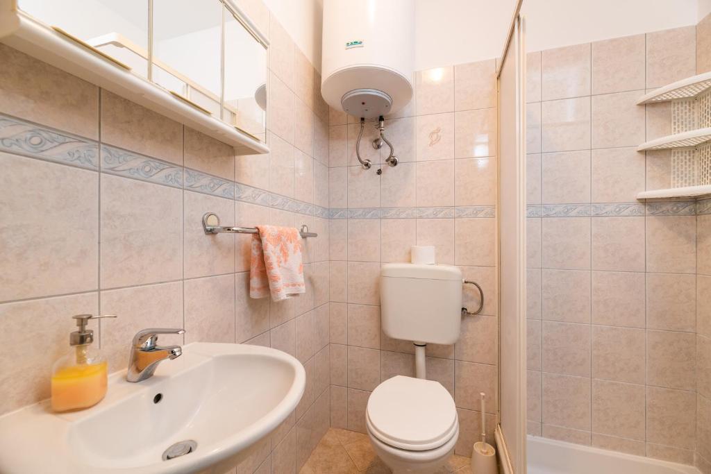 Kúpeľňa v ubytovaní Apartman Petelin