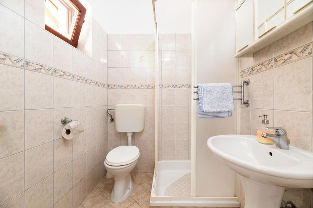 Kúpeľňa v ubytovaní Apartman Petelin