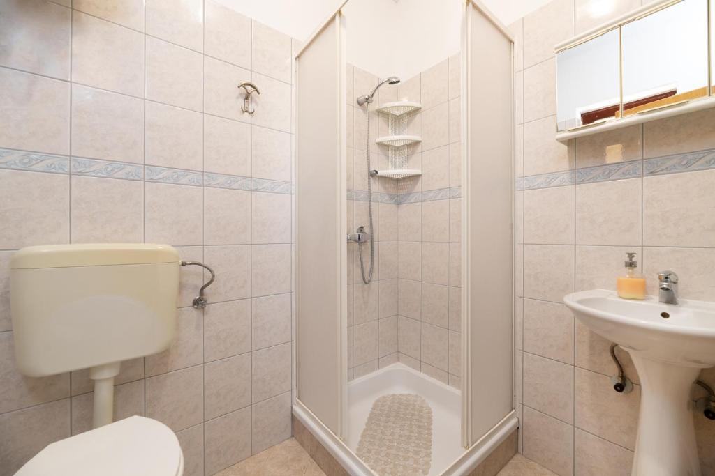 Kúpeľňa v ubytovaní Apartman Petelin